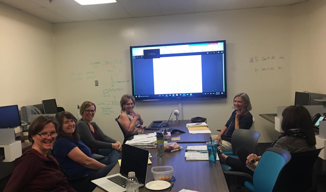 Unit4, Selkirk, and VIU employees engaged in brainstorming